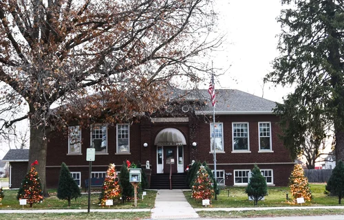 Old building adorned with holiday lights