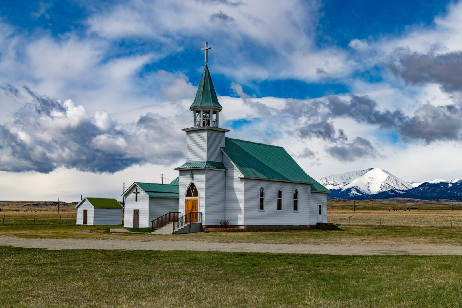 Scenic view of church and mountains