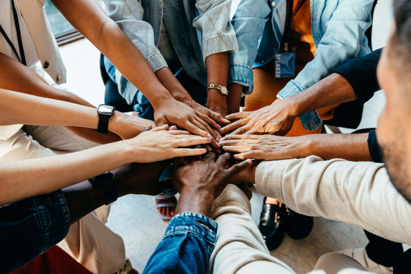 Group hands joining in unity