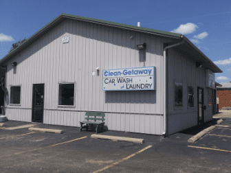 Small laundromat and car wash building