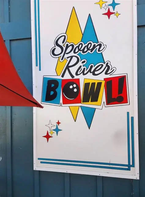 Retro Spoon River Bowl sign with bowling ball