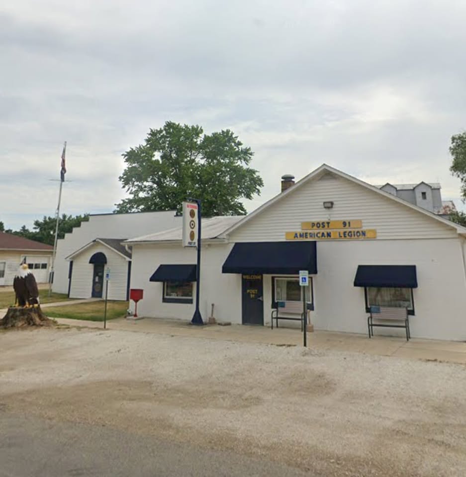 American Legion post with eagle carving